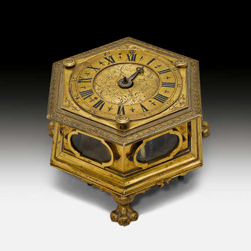 A HEXAGONAL TABLE CLOCK,