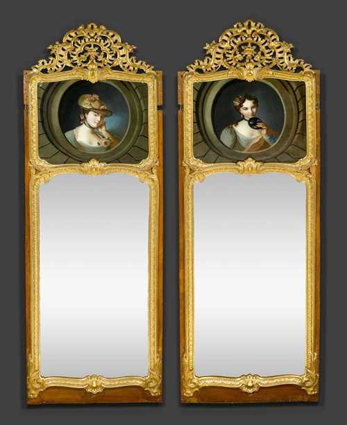 PAIR OF TRUMEAU MIRRORS,Louis XV, by J.F. FUNK I (Johann Friedrich Funk, 1706 Bern 1775), the paintings attributed to J.E. HANDMANN (Jakob Emanuel Handmann, Basel 1718-1781 Bern), Bern circa 1764/65. Pierced and exceptionally finely carved gilt wood. The oil paintings with fine portraits of ladies. On original oak mount. H 282 cm, W 92 cm. Provenance: Formerly Guemligen Castle.