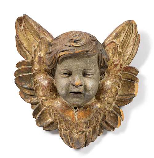 A CARVED AND PAINTED ANGEL&#39;S HEAD