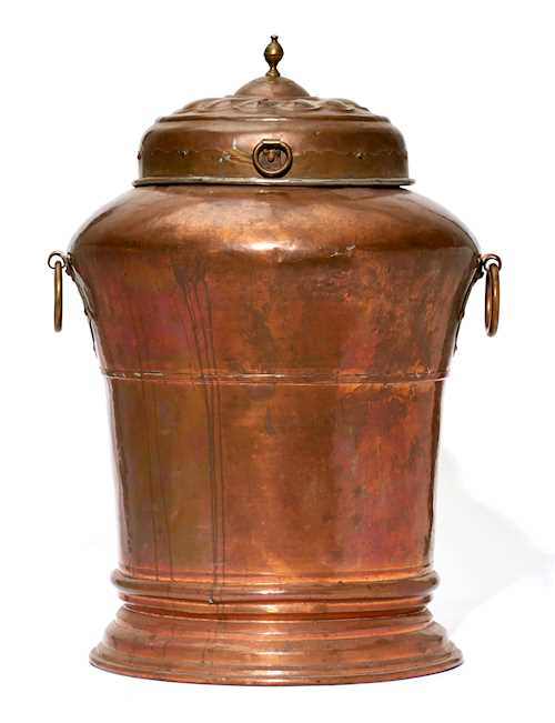 A CHASED COPPER WATER VESSEL,