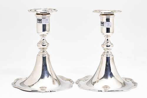 PAIR OF SMALL SILVER-PLATED CANDLESTICKS