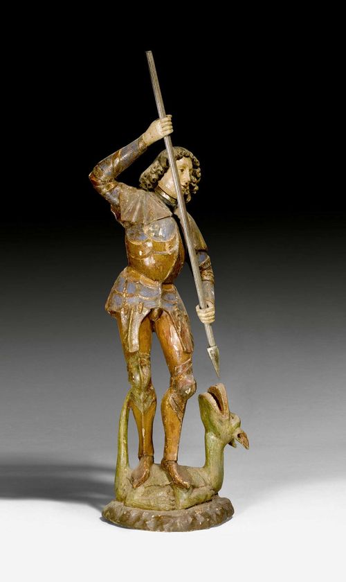 SAINT GEORGE AND THE DRAGON,Gothic, Alpine region, probably Tyrol circa 1480/1500. Carved and painted wood, hollowed verso. The lance and hand later, the paint brittle. H 92 cm.