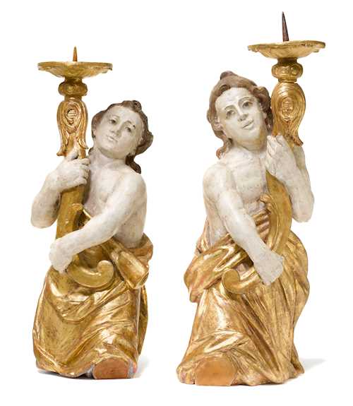 PAIR OF CANDLESTICKS DESIGNED AS HALF-HEIGHT FIGURES