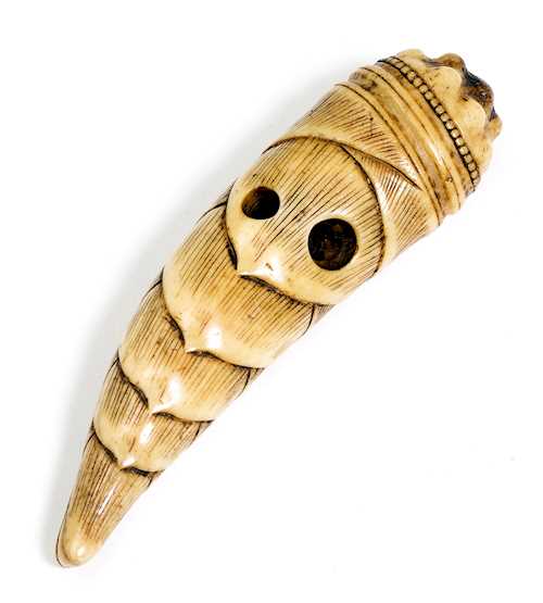 A STAG ANTLER NETSUKE OF A BAMBOO SHOOT.