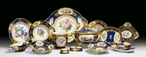 PORCELAIN TABLE SERVICE, Sevres/Paris, 19th century. Comprising: 12 plates, 12 soup plates, 12 small plates, 2 shell-shaped bowls 'compotiers coquilles', 2 small bowls 'plateaux losanges', 1 small bowl, 1 quatrefoil-shaped bowl, 1 large bowl, 1 small bowl with cover and stand 'sucrier de Monsieur Le Premier', 1 large round bowl 'jatte ronde', 1 tureen and cover with stand, 1 sauceboat, 1 single salt cellar, 1 double salt cellar, 1 bottle cooler 'seau a bouteille', Sevres and Y in blue, LL monogram marks. The tureen broken. Total of 51 pieces.