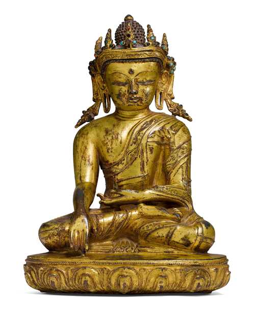 A GILT COPPER ALLOY FIGURE OF THE CROWNED BUDDHA.