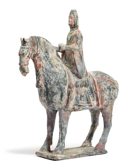 A POTTERY HORSE AND RIDER.