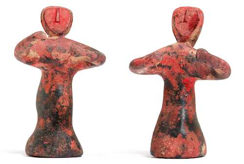 TWO SMALL POTTERY FIGURINES.
