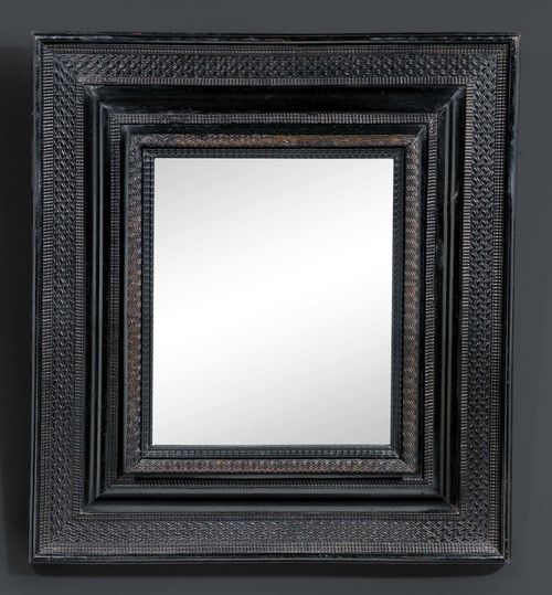 MIRROR,Baroque, Netherlands, 17th century. Ebony with fine flame molding. H 106 cm. W 96 cm. Provenance: from a German private collection, acquired in Maastricht in 2002.