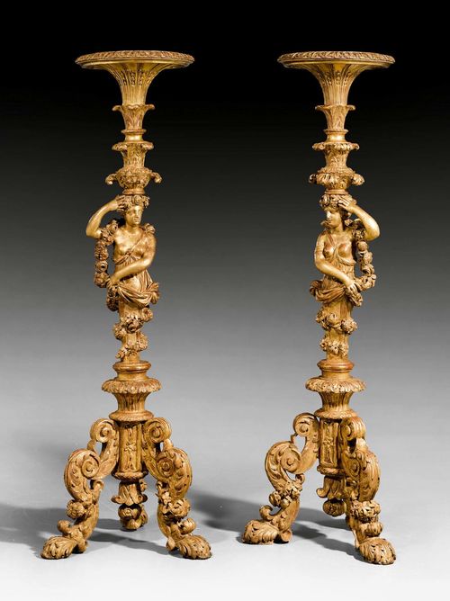 PAIR OF PORTES-TORCHERES "AUX CARIATIDES",Louis XIV, Paris circa 1700/15. Exceptionally richly carved and gilt wood. The top restored. H 148 cm.