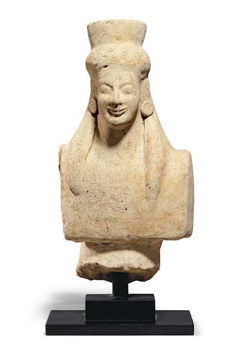 FEMALE BUST WEARING A POLOS AND EARRINGS
