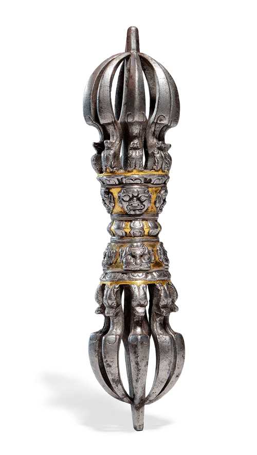 A MAGNIFICENT AND RARE EIGHT-PRONGED IRON VAJRA.