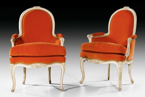 PAIR OF PAINTED BERGERES,Louis XV, stamped J.B. BOULARD (Jean-Baptiste Boulard, maitre 1755), Paris circa 1760. Shaped, finely carved and white painted beech. Orange velour cover. Seat cushion. 60x44x48x93 cm.