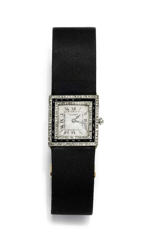 ONYX AND DIAMOND LADY'S WRISTWATCH, CARTIER, ca. 1918. Platinum and yellow gold, clasp in pink gold. Square case with gold wire attaches and diamond-set crown. Back with mark "EJ". Lunette set throughout with numerous rose-cut diamonds and additionally decorated with 1 line of facetted "French-cut" onyx. Silver-coloured, engine-turned dial with black Roman numerals and blue Breguet hands, signed Cartier Paris. Black satin band with diamond and onyx-set fold-over clasp.  Ca. 23 x 23 mm.
