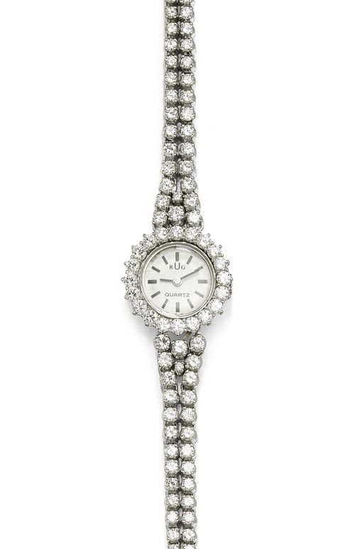 DIAMOND LADY'S WRISTWATCH, RUG, ca. 1980. White gold 750. Round case with brilliant-cut diamond lunette weighing ca. 1.00 ct. Silver-coloured dial with black indices and hands, signed Rug. Quartz movement. Double-row Rivière bracelet, set with 96 brilliant-cut diamonds weighing ca. 3.60 ct, L ca. 18 cm. D 21 mm.