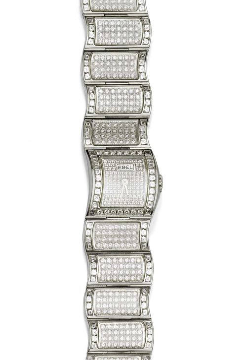 DIAMOND LADY'S WRISTWATCH, EBEL, GEMS OF OCEAN, ca. 2002. White gold 750. Haute Joaillerie Collection: Model "Gems of the Ocean - Vanua - Rock Crystal", Ref. E3057H26-500, limited series No. 1/50. Case No. 8230029 integrated in the band, dial set with brilliant-cut diamonds, silver-coloured hands. Quartz movement. Very fancy bracelet with wave motif, set throughout with numerous brilliant-cut diamonds and with square-cut diamonds as the border. Total weight of the diamonds ca. 10.92 ct. L ca. 17 cm. With case, warranty and confirmation of value by Ebel.