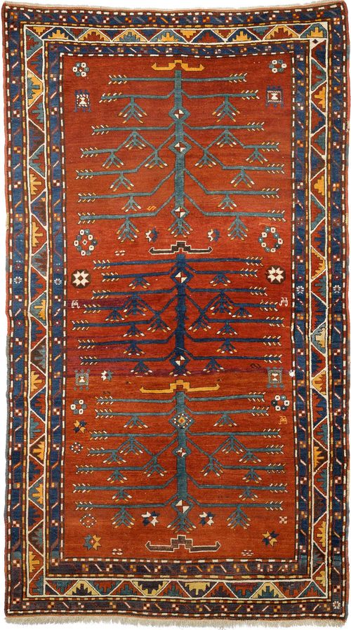 KAZAK antique.Red ground with three trees of life, three-stepped border, slight traces of wear, 154x274 cm.