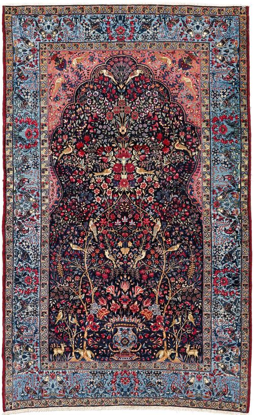 TEHRAN PRAYER RUG antique.Dark blue mihrab with pink spandrels, richly patterned with plants and birds, light blue border, 140x227 cm.