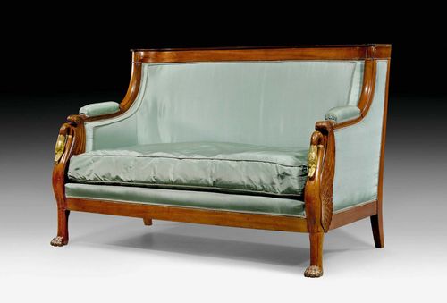 CANAPE "AUX CYGNES",Empire, stamped JACOB FRERES RUE MESLEE (collaboration of Georges Jacob and Francois Honore Georges Jacob-Desmalter 1803-1813), Paris circa 1802/04. Mahogany and gilt bronze. Replaced back legs. Green silk cover. Seat cushion. Verso with label "Chambre a coucher de la Madame la Princesse Potoska". 145x80x48x91 cm. Provenance: - Former property of Princess Potocka. - From a French collection. Expertise by Cabinet Dillee, Guillaume Dillee/Simon Pierre Etienne, Paris 2012.