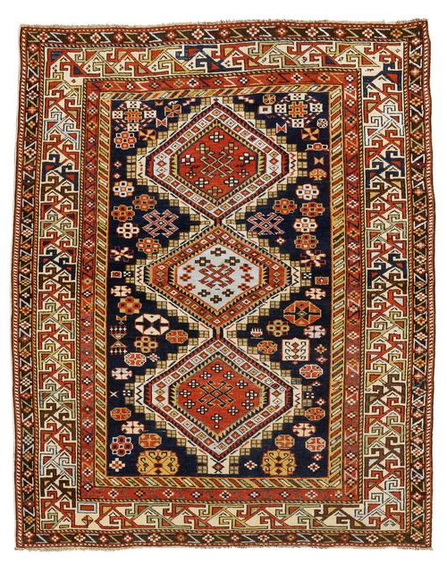 SHIRVAN antique.Dark blue central field with three medallions, geometrically patterned, white edging, signs of wear, 122x151 cm.