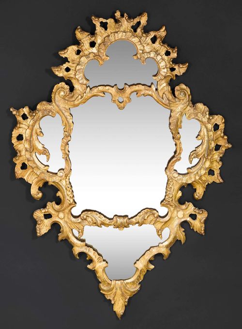 MIRROR, Louis XV, northern Italy circa 1760. Pierced, carved and gilt wood. H 118 cm, W 80 cm.