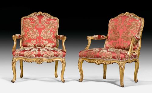 PAIR OF LARGE FAUTEUILS "A LA REINE", Louis XV, stamped L. CRESSON (Louis Cresson, maitre 1738), Paris circa 1760. Shaped, finely carved and gilt beech. Wine-red silk cover with colorful flowers and leaves. 70x50x45x95 cm.