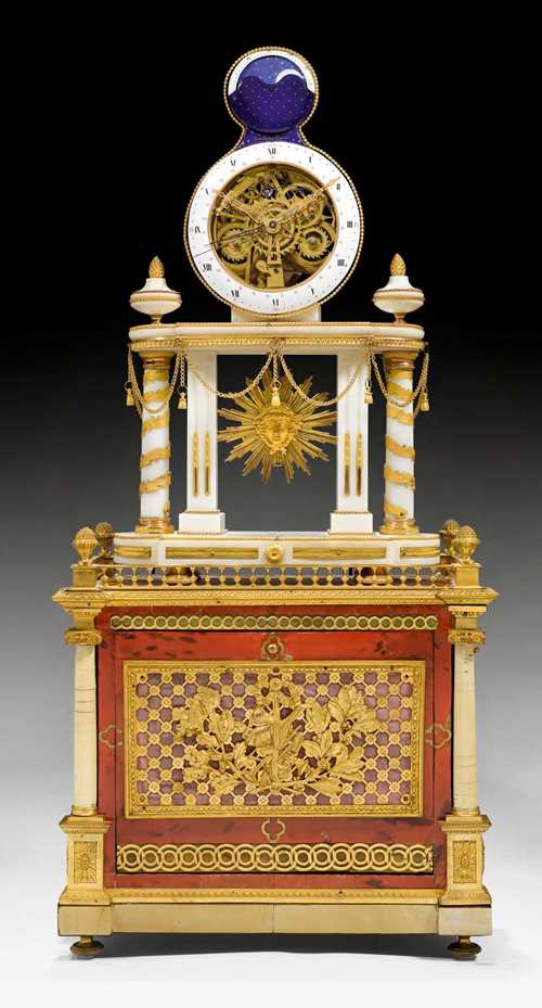 SKELETON CLOCK WITH MOON PHASE AND ORGAN,Louis XVI, the dial stamped GUIBET A PARIS, Paris circa 1800. White marble, red tortoiseshell and gilt bronze with tulipwood and rosewood. Enamel chapter ring with 3 fine, pierced and parcel gilt hands. Finely enameled moon phase in the manner of J. Coteau. Skeleton spring-driven movement with pinwheel escapement striking the hours and 1/2 hours on bell, the organ with bellows, barrel, 14 tin pipes and 7 melodies triggered on the hour and on demand. The organ is triggered about 2 minutes before hour striking. Exceptionally fine, matte and polished gilt bronze mounts and applications. 41x23x87 cm.