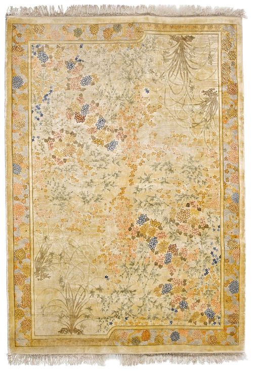 CHINESE SILK old.The beige ground is patterned throughout with plant motifs in delicate pastel colours. With a light blue border. Some light wear, 243x335 cm