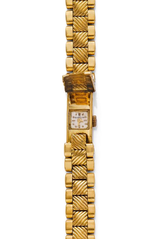 LADY'S WRISTWATCH, GÜBELIN, 1950s. Yellow gold 750, 59g. Polished, rectangular case (screw missing) with folding mechanism integrated in the band. Case No. 158422. Silver-plated dial with applied indices and gold hands, signed: Gübelin. Small hand-winding form movement Cal. FHF 59-21. Integrated gold band, polished and engraved. L 17.5 cm, D 12 mm.