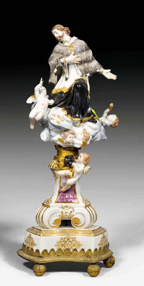 SAINT JOHN NEPOMUK ON A CLOUD WITH PLINTH, MEISSEN, 18th CENTURY. The model by Johann Gottlieb Kirchner from 1731. Molded later. Mounted on a gilt metal base. Underglaze blue sword mark. H 80 cm. Light restoration and chips, the cross missing in the hands of the left angel. The mount later. Provenance: - Ladanyi Laszlo, Hungarian priest in China. - Private collection, Zurich.