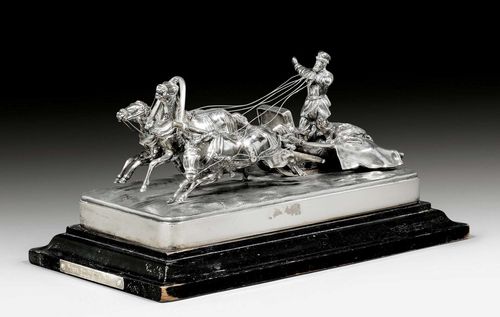 RUSSIAN TROIKA, St. Petersburg 1883.Maker's mark: Pavel Sasikov (widow) With assay master's mark. Troika sculpture on a wooden plinth. Cast and chased silver. L 30 cm.