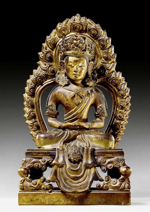 A GILT BRONZE AMITAYUS WITH INSCRIPTION. Tibeto-chinese, Qianlong period, dated 1770, height 21 cm. Kalasha missing.