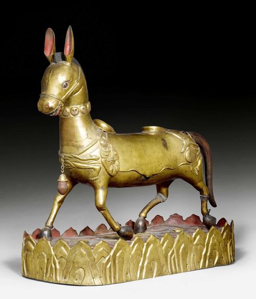 A LARGE REPOUSSE GILT COPPER FIGURE OF A MULE. China/Mongolia, 19th c. Height 63 cm.