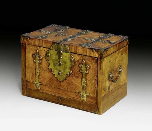 LARGE COFFER, Louis XIV, probably from the Netherlands ca. 1700. Rosewood and purpleheart in veneer, inlaid "en papillon". Hinged cover and hinged front. The inside divided into a large compartment, 2 secret compartments in the lid and 2 adjacent drawers. Fine bronze mounts. 37x26x23 cm. Provenance: private collection, Lugano.