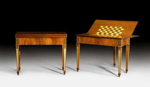 PAIR OF GAMES TABLES "A MECANISME", Louis XVI, attributed to D. ROENTGEN and his workshop (David Roentgen, Neuwied 1741-1809 Paris), Neuwied ca. 1785. Mahogany in veneer. Rectangular, triple-foldable leaf, lines with green felt. Inlaid with checkers game board, can also be used as a bookrest. Backgammon game board pops up with the aid of a spring mechanism. Secret drawer behind the foldable leg. Removable legs. Fine gilt bronze and brass mounts. 98x48.5x(open 96)x79.5 cm. Provenance: - formerly Didier Aaron, Paris. - from a European collection.