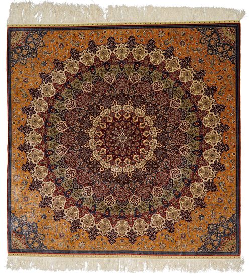 HEREKE SILK.Fineness: 10x10 knots/cm2. Dusky pink central field with a large central medallion in red, blue, white and grey, blue corner motifs. The entire carpet is finely patterned with trailing flowers and palmettes, in good condition, 214x226cm.