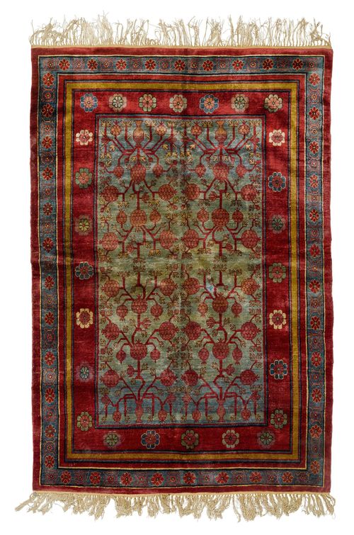 SAMARKAND SILK antique.Turquoise central field patterned throughout with pomegranates in shades of red, wide border in blue and red, in good condition, 160x225 cm.