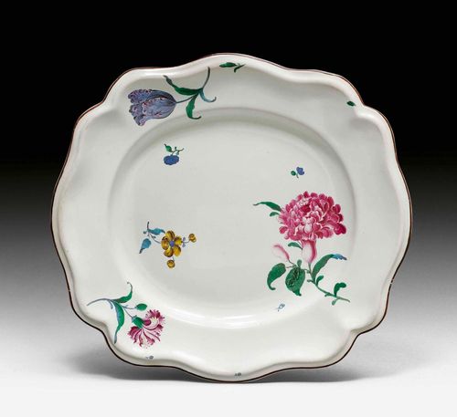 OVAL FAIENCE PLATTER 'FLEURS FINES', Strasbourg, Paul Hannong period, ca. 1750. D 32 cm. The edge slightly retouched, hairline crack in the glaze on the back.