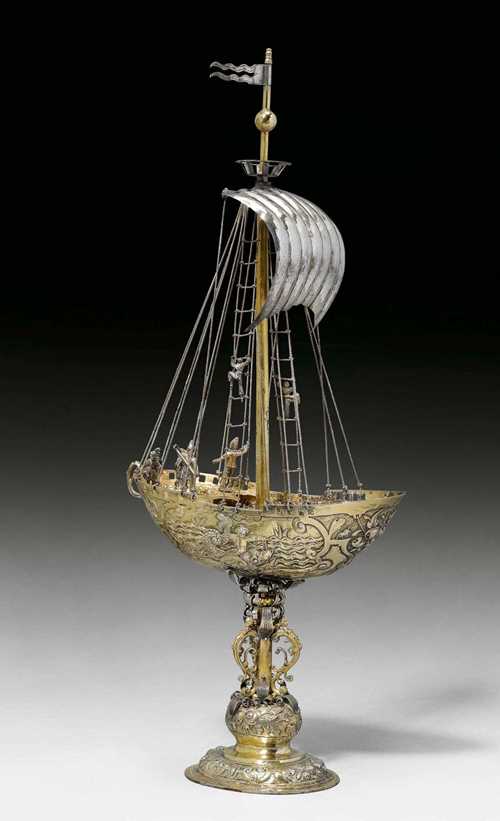 DRINKING VESSEL, Augsburg 1600-1610. Maker&#39;s mark: Heinrich Winterstein. Parcel-gilt. The sails and flags in silver. H 40 cm, 460g. Provenance: - Fritz Payer TEFAF, Maastricht 2003. - German private collection.
