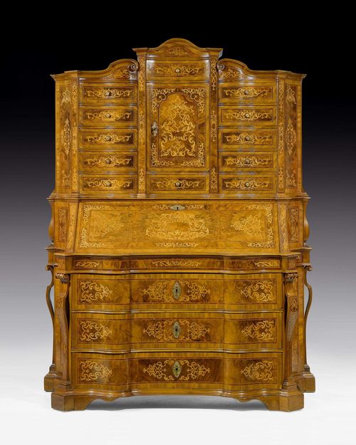 TABERNACLE BUREAU CABINET, Baroque, Rome circa 1710/20. Walnut, burlwood, cherry, elm and local fruitwoods, exceptionally richly inlaid on all sides. Hinged writing surface and a fitted interior of drawers and compartments. Secret compartment. Central lock. Bronze mounts and knobs. Restorations and supplements. 150x70x(open 85)x218 cm. Provenance: - Private collection, Germany. - Galerie Koller Zurich auction on 17.9.1997 (Lot No. 558). - Swiss private collection. Illustrated on the title page and on p. 163 in: C. Schatt, Barock- und Rokokomoebel, Munich 2000.