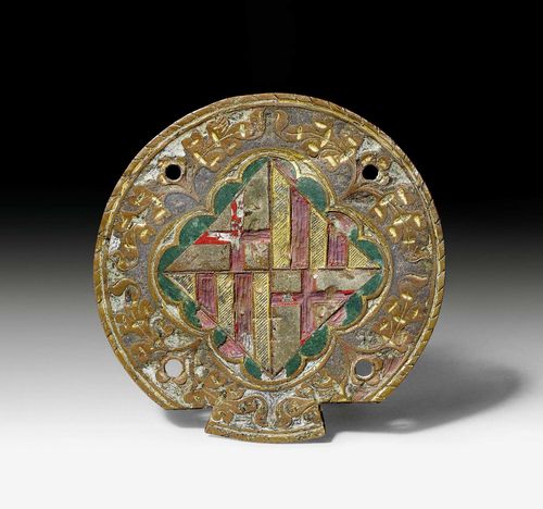 BLINKER MOUNT FOR A TOURNAMENT HORSE, Renaissance, Barcelona, 15th century. Copper and "champleve" enamel. With coat of arms of the city of Barcelona. D 12 cm. With letter from Dr. O. Neubecker from the 7.6.1988 confirming the identification of the coat of arms.