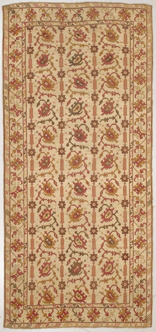 EUROPEAN CARPET old. Beige ground, patterned throughout with stylised plant motifs, signs of wear, 175x370 cm.