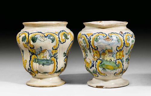 PAIR OF MAIOLICA VASES, Naples, in the style of Angelo del Vecchio, 2nd half of the 18th century. Painted with a landscape cartouche and verso 1746 in blue. H 18.5 cm. Minor chips to the edge. (2)