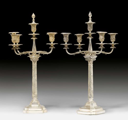 PAIR OF FIVE-ARMED CANDELABRAS,London, 1889/90. Maker&#39;s mark Edgar Finley &amp; Hugh Taylor. Square, stepped plinth. Top with five light branches decorated with acanthus leaves. Foot weighted. H 61 cm.