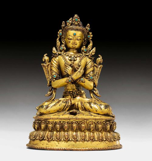 A GILT COPPER ALLOY FIGURE OF VAJRADHARA WITH TURQUOISE INLAYS. Nepal, 17th c. Height 16.5 cm.