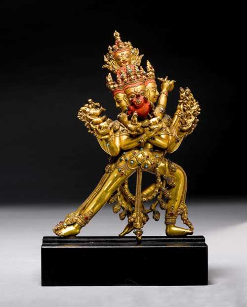 AN EXCELLENT GILT COPPER ALLOY FIGURE OF KAPALADHARA HEVAJRA. Tibet, first half of 15th c. Height 19.5 cm. Original base lost.