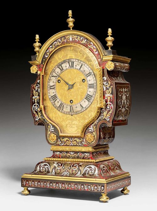 BOULLE CLOCK "TETE DE POUPEE",Louis XIV, the dial and movement signed ROQUELON A PARIS (Etienne Roquelon, maître 1718), Paris ca. 1700/10. Red tortoise shell, ebonized wood, gilt bronze as well as fine brass and tin inlays.  Finely engraved and gilt copper plate with silver-plated dial ring with hours in Roman numerals and minutes in Arabic numerals. 2 blued hands. Fine verge escapement striking 4/4-hours on 3 bells. Gilt mounts and applications. Requires servicing. 33x19x66 cm. Provenance: From a Swiss private collection.