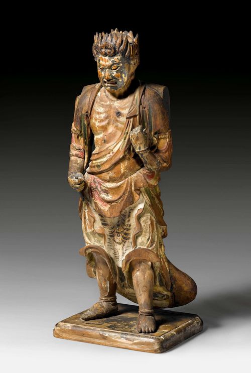 A FIERCE WOODEN PROTECTIVE DEITY "MYÔÔ". Japan, pre-Edo period, height 46 cm. Further arms and attributes lost.
