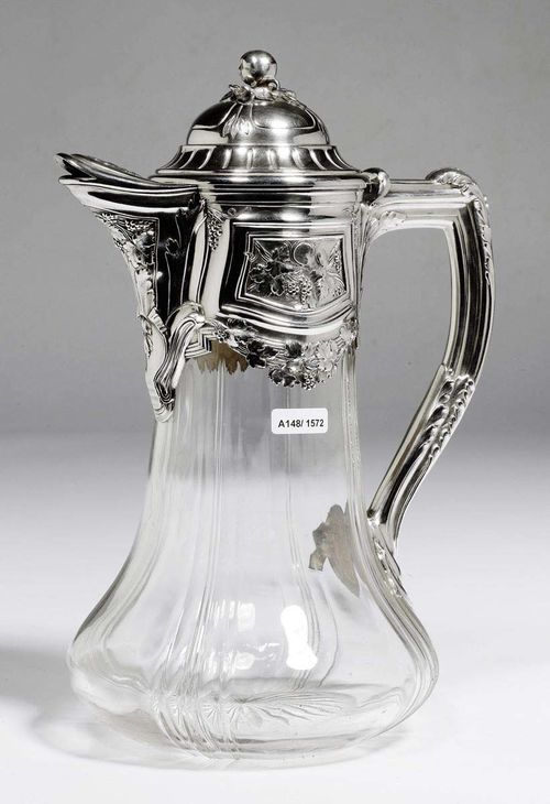 CARAFE. Paris, late 19th century.Mark Risler et Carre. Crystal with silver mounts. H 28.3 cm.