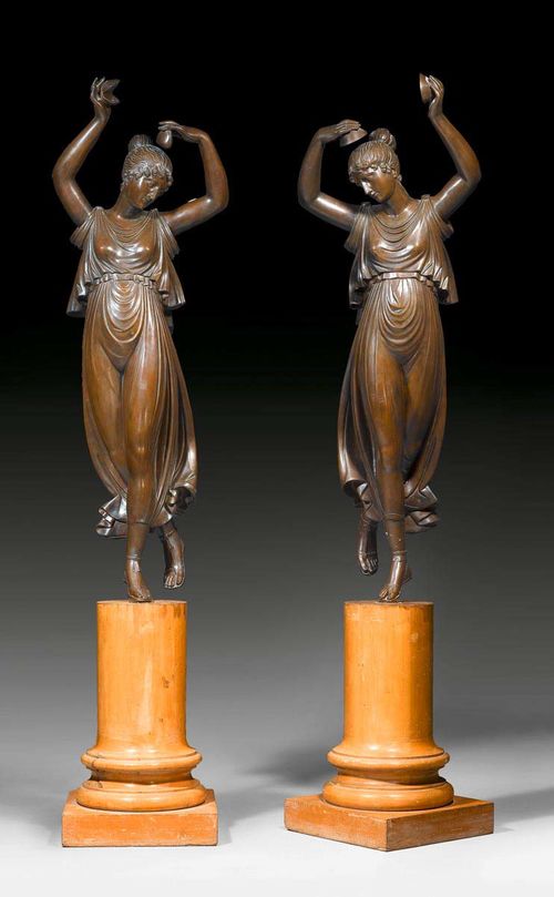 PAIR OF BRONZE FIGURES "LES DANSEUSES",Empire style, after models by A. CANOVA (Antonio Canova, Possagno 1757-1822 Venice), Italy. Burnished bronze. On "en faux marbre" column base. H with base 250 cm.